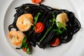 Spaghetti al Nero di Seppia with Squid Ink and Prawns Royalty Free Stock Photo