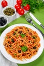 Spaghetti alla puttanesca with capers, top view