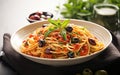 Spaghetti alla Puttanesca Elevated with Tomatoes, Olives, Capers, and Italian Flat-Leaf Parsley, Crafted to Culinary Perfection