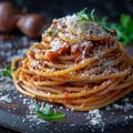 Spaghetti with Amatriciana sauce, grated cheese and greens. Traditional homemade pasta with salsa alla matriciana Royalty Free Stock Photo