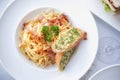 Spaghetti with bacon and garlic bread Royalty Free Stock Photo