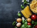 Spaghetti, Basil, Eggs, Tomatoes on Black Background Royalty Free Stock Photo