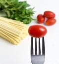 Spaghetti, basil and tomatoes Royalty Free Stock Photo