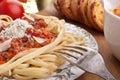 Spaghetti bolognese with cheese and a fork Royalty Free Stock Photo