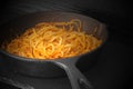 Spaghetti bolognese cooked in a cast iron frying pan. Royalty Free Stock Photo