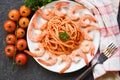 Spaghetti bolognese italian pasta with shrimp prawn served on white plate with tomato parsley in the restaurant italian food and Royalty Free Stock Photo