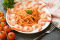 Spaghetti bolognese italian pasta with shrimp prawn served on white plate with tomato parsley in the restaurant italian food and Royalty Free Stock Photo