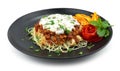 Spaghetti Bolognese Lentil Curry Sauce ontop Yogurt Sauce and leaf mint Royalty Free Stock Photo