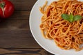 Spaghetti bolognese pasta with tomato sauce and minced meat, grated parmesan cheese and fresh basil Royalty Free Stock Photo
