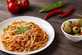 Spaghetti bolognese pasta with tomato sauce and minced meat, grated parmesan cheese and fresh basil Royalty Free Stock Photo