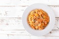 Spaghetti bolognese pasta with tomato sauce, vegetables and chicken meat on white wooden rustic background. Traditional italian fo Royalty Free Stock Photo