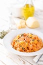 Spaghetti bolognese pasta with tomato sauce, vegetables and chicken meat on white wooden rustic background. Traditional italian fo Royalty Free Stock Photo