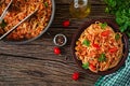 Spaghetti bolognese pasta with tomato sauce, vegetables and minced meat Royalty Free Stock Photo