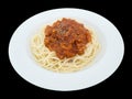 Spaghetti bolognese on a plate isolated on the black background Royalty Free Stock Photo