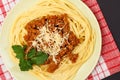 Spaghetti bolognese on a plate with kitchen napkin Royalty Free Stock Photo