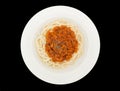Spaghetti bolognese with pork or meat tomato sauce on a plate isolated on the black background with clipping path Royalty Free Stock Photo