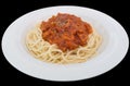 Spaghetti bolognese with pork or meat tomato sauce on a plate isolated on the black background with clipping path.