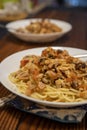 Spaghetti bolognese served in the plate. Homemade dish