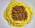 Spaghetti bolognese in top-down view. Classic Italian pasta made with spaghetti and tomato sauce with ground beef and spices on a Royalty Free Stock Photo