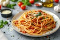 Spaghetti Bolognese in a white plate on black slate background. Italian pasta with minced beef sauce, tomatoes, parmesan Royalty Free Stock Photo