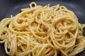 Spaghetti cacio e pepe isolated on white background