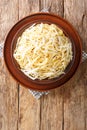 Spaghetti Cacio e Pepe Recipe closeup in the plate. Vertical top view