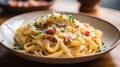 Spaghetti carbonara with bacon and parmesan on wooden table.