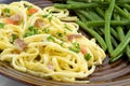 Spaghetti carbonara and beans Royalty Free Stock Photo