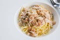 The spaghetti carbonara with cream cheese and ham on the table ready to be served. Royalty Free Stock Photo