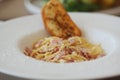 Spaghetti Carbonara, Italian Pasta with cream sauce and ham in the white plate. Royalty Free Stock Photo