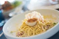 Spaghetti carbonara with scallops