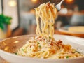 spaghetti carbonara , showcasing the rich texture and vibrant colors of the sauce and cheese. Royalty Free Stock Photo