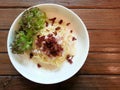 Spaghetti carbonara on wood table