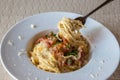 Spaghetti Carbonara on wooden table. Classic homemade carbonara pasta with pancetta.  Carbonara pasta, spaghetti with bacon,egg,ch Royalty Free Stock Photo