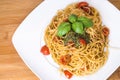 Spaghetti with cherry tomatoes and pesto Royalty Free Stock Photo