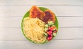 Traditional dish consisting of spaghetti with chicken cutlets and vegetable salad. Royalty Free Stock Photo