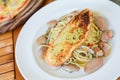 Spaghetti clams with garlic bread