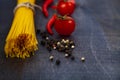 Raw pasta,tomatoes and chili Royalty Free Stock Photo