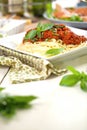 Spaghetti dinner with meat sauce and basil close up Bolognese. Royalty Free Stock Photo