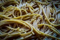 Spaghetti of durum wheat, seasoned with linseed oil, close-up Royalty Free Stock Photo