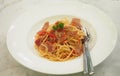 Spaghetti with Garlic, Dried Chili and Bacon in white plate, food Royalty Free Stock Photo