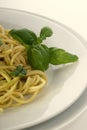 Spaghetti with home made pesto on a plate Royalty Free Stock Photo