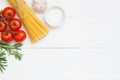 Spaghetti ingredients concept on white background, top view