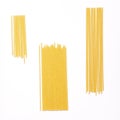 Spaghetti italian food on white background. Top view piles of uncooked pasta, stylish wallpaper for products packaging