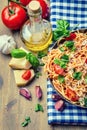 Spaghetti. Italian and Mediterranean cuisine. Spaghetti bolognese with cherry tomato and basil. Royalty Free Stock Photo