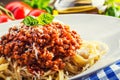 Spaghetti. Italian and Mediterranean cuisine. Spaghetti bolognese with cherry tomato and basil. Royalty Free Stock Photo