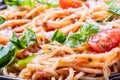 Spaghetti. Italian and Mediterranean cuisine. Spaghetti bolognese with cherry tomato and basil. Royalty Free Stock Photo