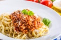 Spaghetti. Italian and Mediterranean cuisine. Spaghetti bolognese with cherry tomato and basil. Royalty Free Stock Photo