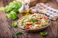 Spaghetti. Italian pasta spaghetti with basil pesto cherry tomatoes and olive oil Royalty Free Stock Photo