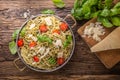 Spaghetti. Italian pasta spaghetti with basil pesto cherry tomatoes and olive oil Royalty Free Stock Photo